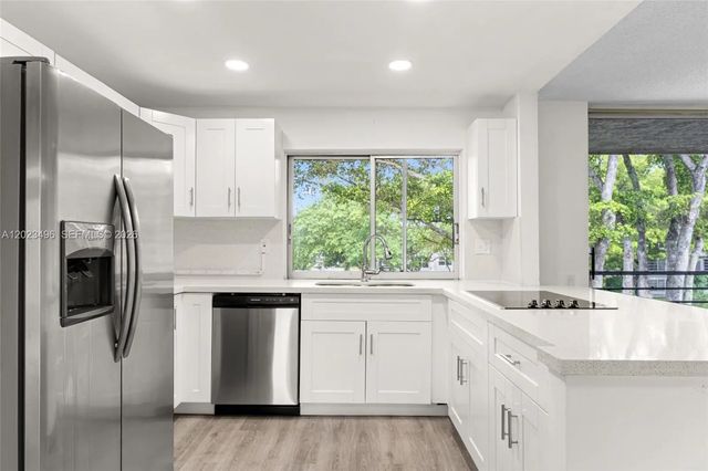 2 of 30 - 9091 Lime Bay Boulevard #304, Tamarac, FL
