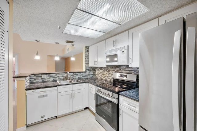 3 of 35 - 5011 Wiles Road #unit 303, Coconut Creek, FL