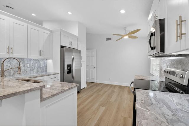 2 of 84 - 5891 Royal Isles Boulevard, Boynton Beach, FL