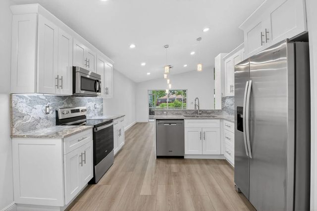 4 of 84 - 5891 Royal Isles Boulevard, Boynton Beach, FL