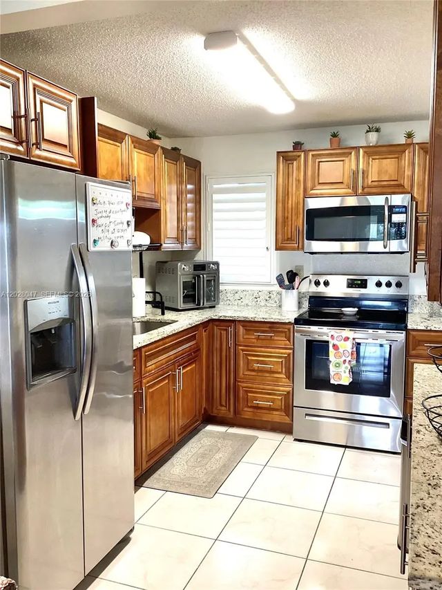 2 of 40 - 8900 Washington Boulevard #415, Pembroke Pines, FL