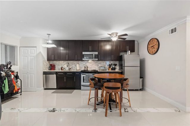 4 of 20 - 567 Trace Circle #104, Deerfield Beach, FL
