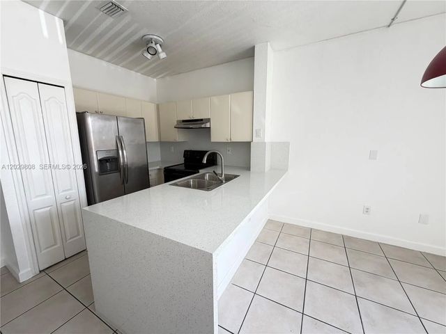 7080 Nw 177th Street #209-13, Hialeah