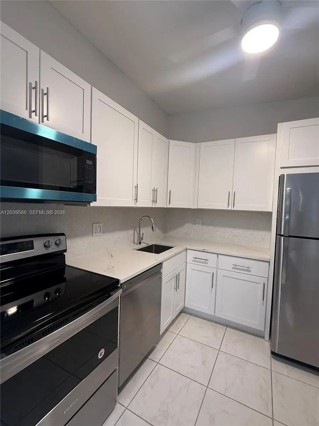 2 of 55 - 7857 Ashmont Circle #213, Tamarac, FL
