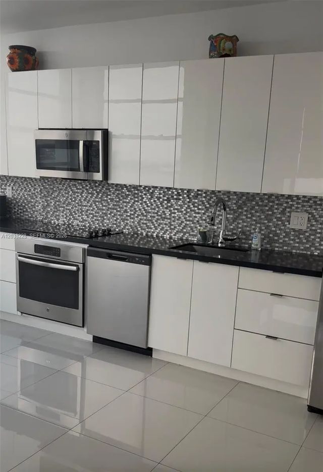 2 of 2 - 11930 N Bayshore Drive #ph-8, North Miami, FL