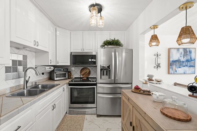 3 of 23 - 200 Village Green Circle E #206, Palm Springs, FL