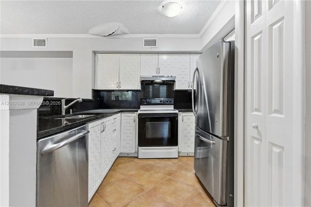 2 of 16 - 1721 Village Boulevard #104, West Palm Beach, FL