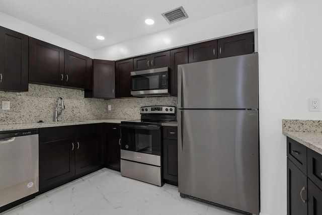 3 of 27 - 10675 Royal Palm Boulevard #1-7, Coral Springs, FL