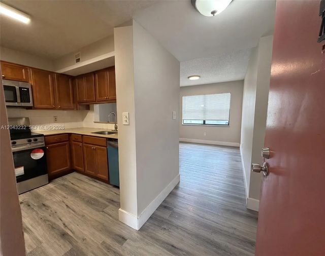 2 of 29 - 3400 Foxcroft Road #215, Miramar, FL