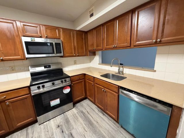4 of 29 - 3400 Foxcroft Road #215, Miramar, FL