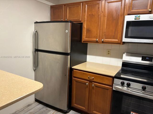 5 of 29 - 3400 Foxcroft Road #215, Miramar, FL