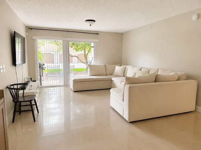 2 of 13 - 5045 Wiles Road #105, Coconut Creek, FL