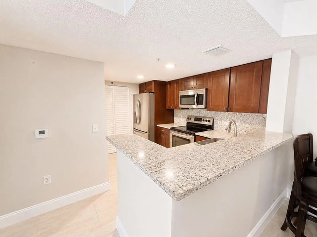 4 of 13 - 5045 Wiles Road #105, Coconut Creek, FL