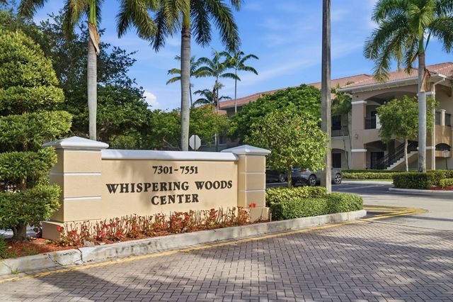 2 of 32 - 7301 Wiles Road #202, Coral Springs, FL