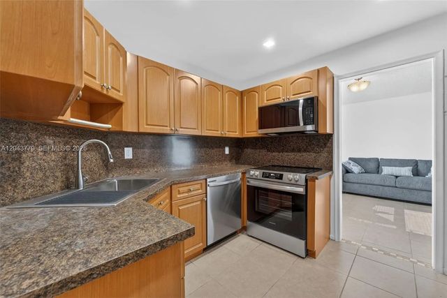 2 of 24 - 3301 Spanish Moss Terrace #405, Lauderhill, FL