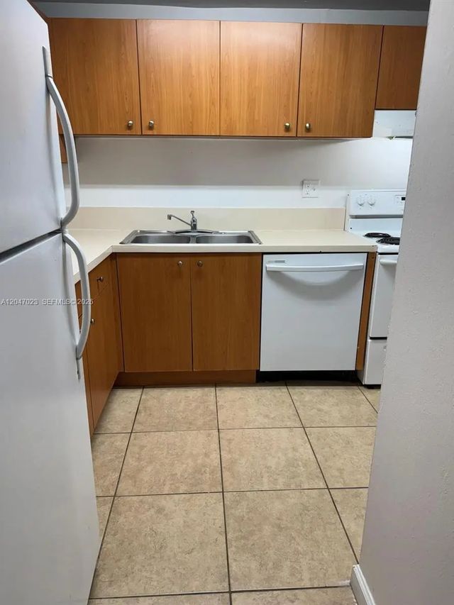 2 of 31 - 411 Executive Center Drive #203, West Palm Beach, FL