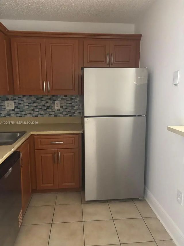 3 of 7 - 7110 Nw 179th Street #211, Hialeah, FL