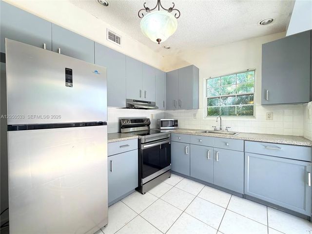 2 of 19 - 9850 W Heather Lane, Miramar, FL