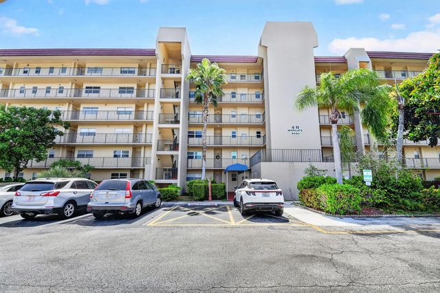 2 of 56 - 3590 Via Poinciana #311, Lake Worth, FL