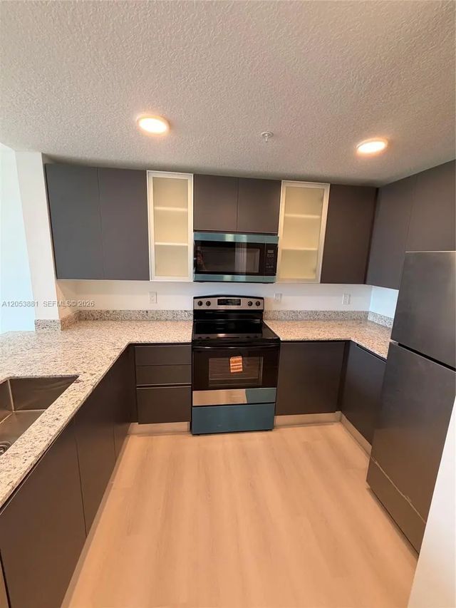 4 of 18 - 5563 Millenia Park Boulevard #212, Orlando, FL