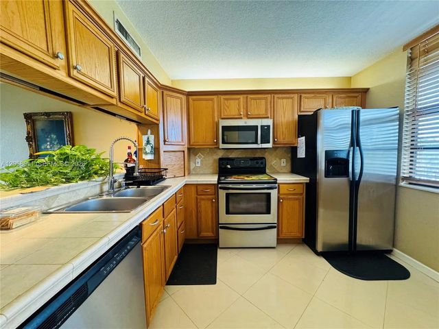 1705 Whitehall Drive #401, Davie