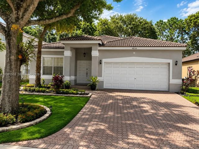 4874 Nw 57th Manor, Coconut Creek