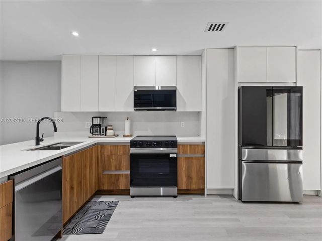 2 of 37 - 9853 Costa Del Sol Boulevard #103-f, Doral, FL