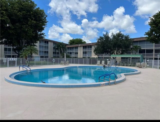 2 of 9 - 400 Village Green Circle W #205, Palm Springs, FL