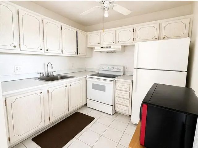 4 of 9 - 400 Village Green Circle W #205, Palm Springs, FL