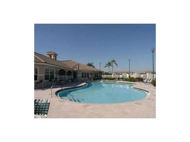 2 of 19 - 5055 Wiles Road #201, Coconut Creek, FL