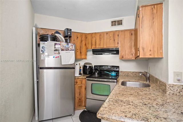 2 of 17 - 213 Lake Pointe Drive #203, Oakland Park, FL