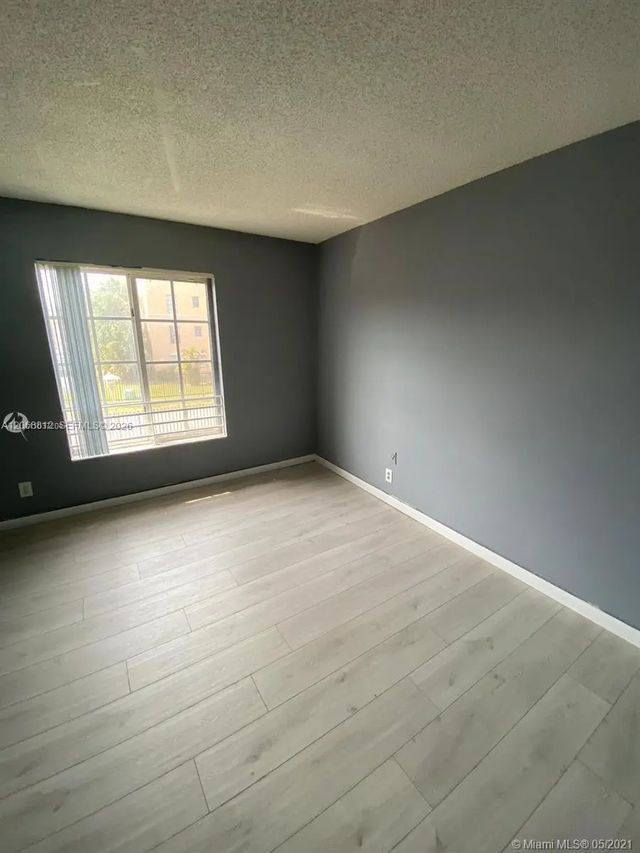 4 of 7 - 5241 Geneva Way #203, Doral, FL