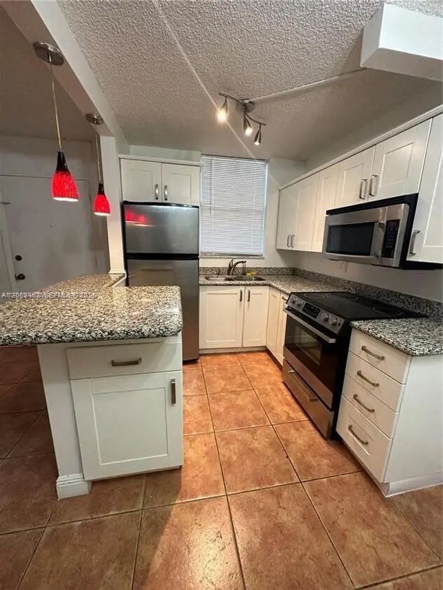1801 S Treasure Drive #112, North Bay Village