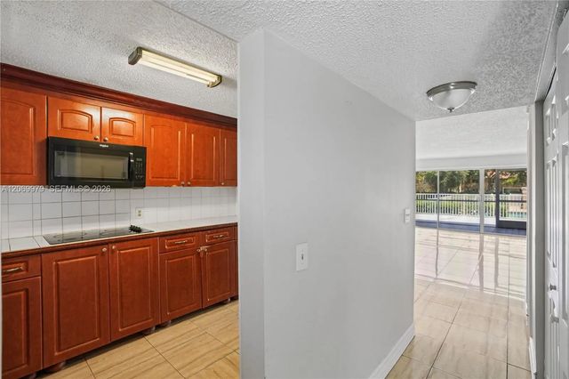 2 of 28 - 661 N University Drive #1-103, Pembroke Pines, FL