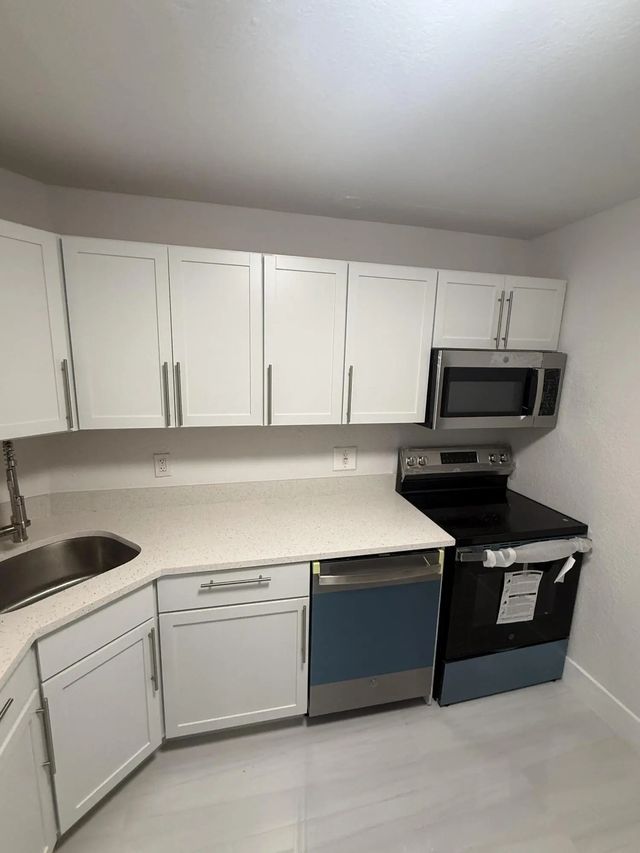 2 of 17 - 10701 Royal Palm Boulevard #1, Coral Springs, FL