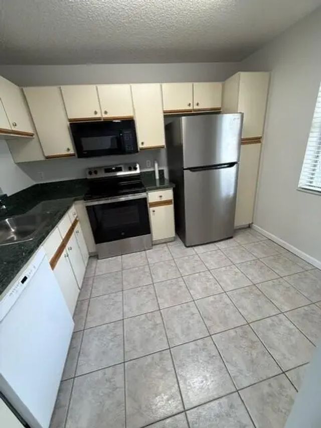 2 of 18 - 3031 Holiday Springs Boulevard #202-7, Margate, FL