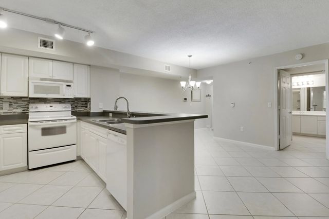 2 of 49 - 236 Village Boulevard #1106, Tequesta, FL