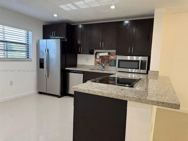 2 of 47 - 6095 N Sabal Palm Boulevard #103, Tamarac, FL