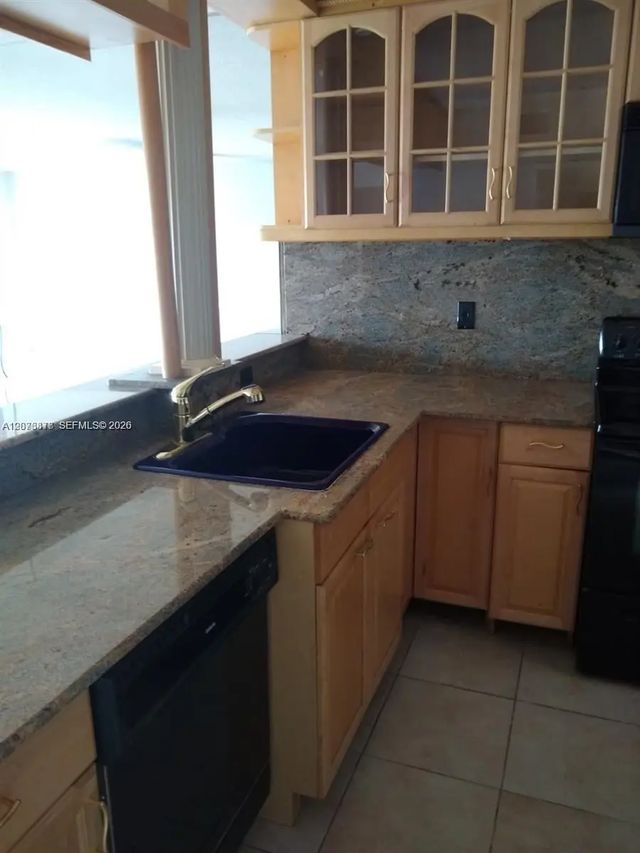 5 of 14 - 401 Golden Isles Drive #211, Hallandale Beach, FL
