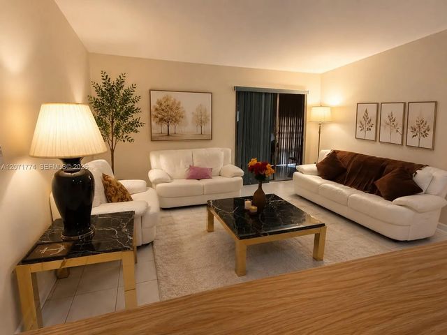 2 of 12 - 9964 N Belfort Circle #201, Tamarac, FL