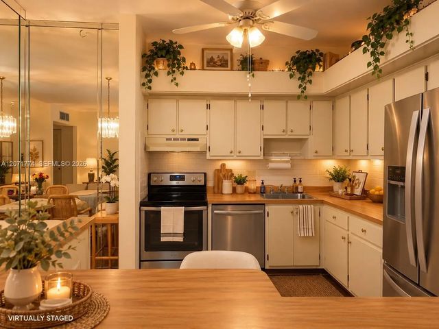 3 of 12 - 9964 N Belfort Circle #201, Tamarac, FL