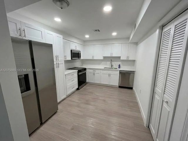 2 of 10 - 16500 Golf Club Road #104, Weston, FL