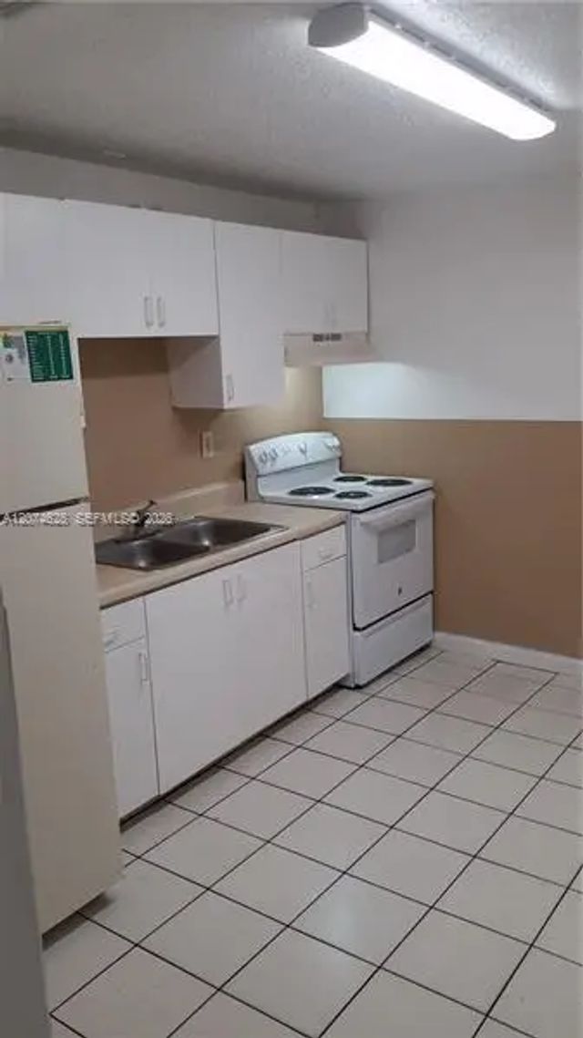 2 of 7 - 5880 Nw 19th Court #13, Lauderhill, FL