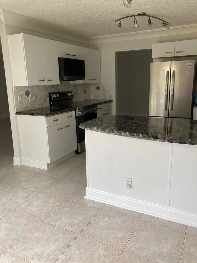 7680 Stone Harbour Drive #3, Lake Worth