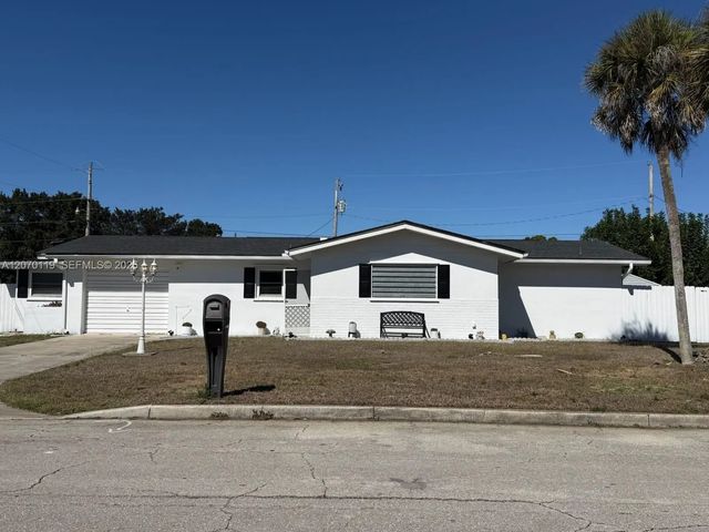 2 of 23 - 129 E Lake Drive, Lehigh Acres, FL