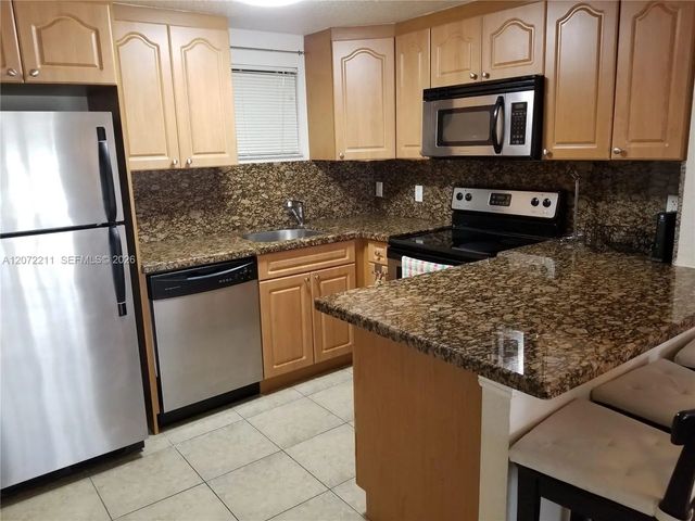 3 of 9 - 8290 Lake Drive #440, Doral, FL