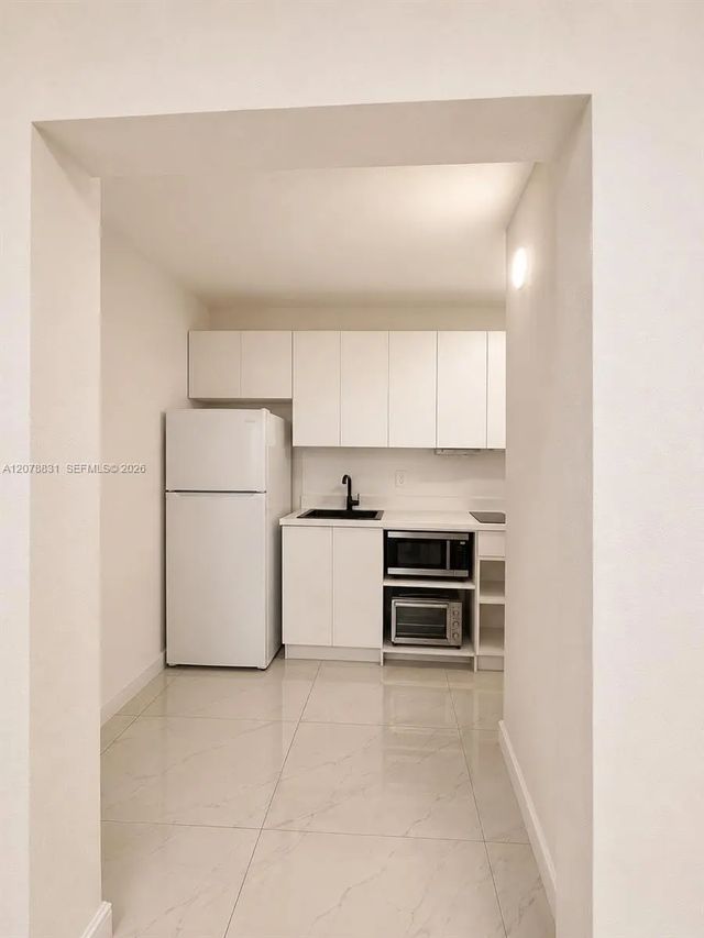 2 of 4 - 5055 Nw 7th Street #1004, Miami, FL