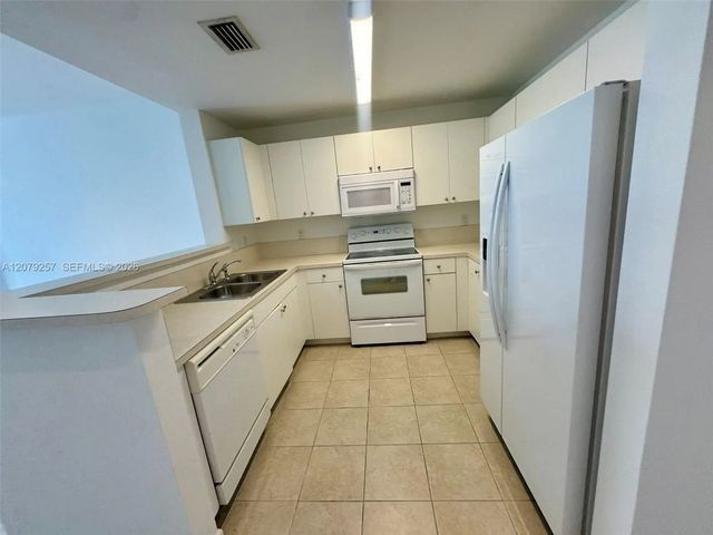 3 of 9 - 10 Aragon Avenue #1008, Coral Gables, FL