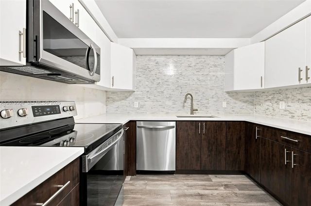 16325 Golf Club Road #104, Weston
