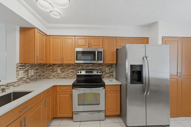 2 of 54 - 6093 Pointe Regal Circle #209, Delray Beach, FL
